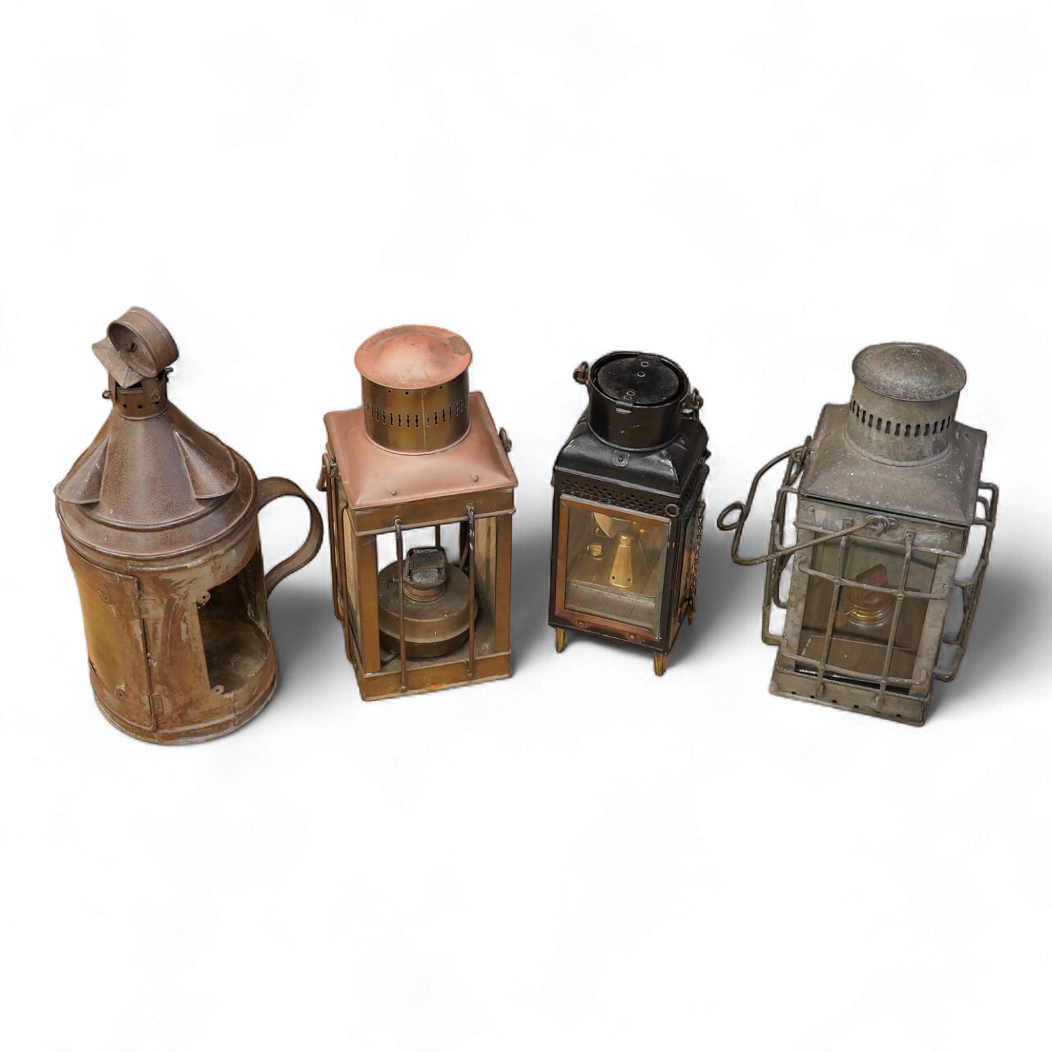 Four various styled lanterns, tallest 42cm high